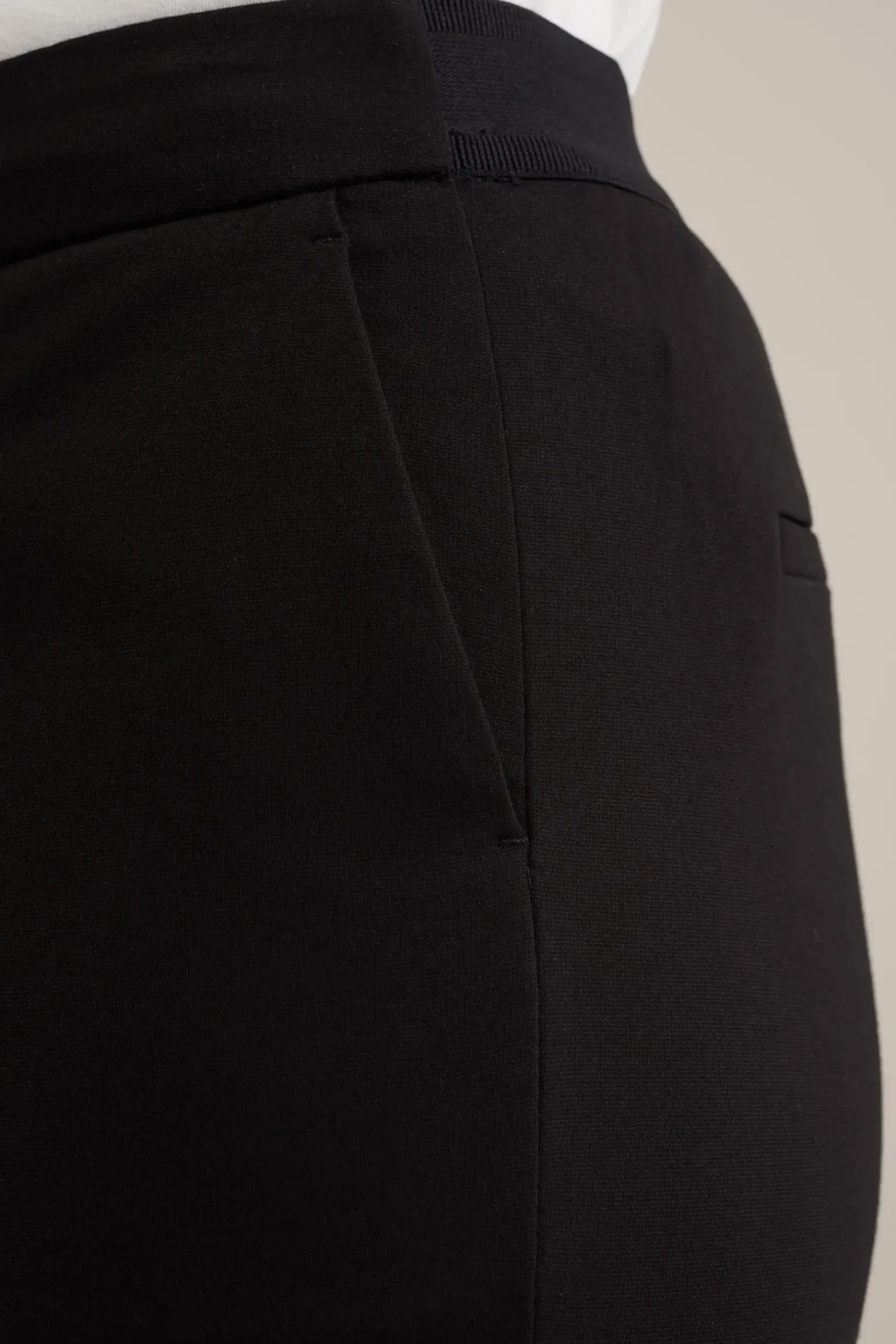 Slim fit flared pantalon met stretch